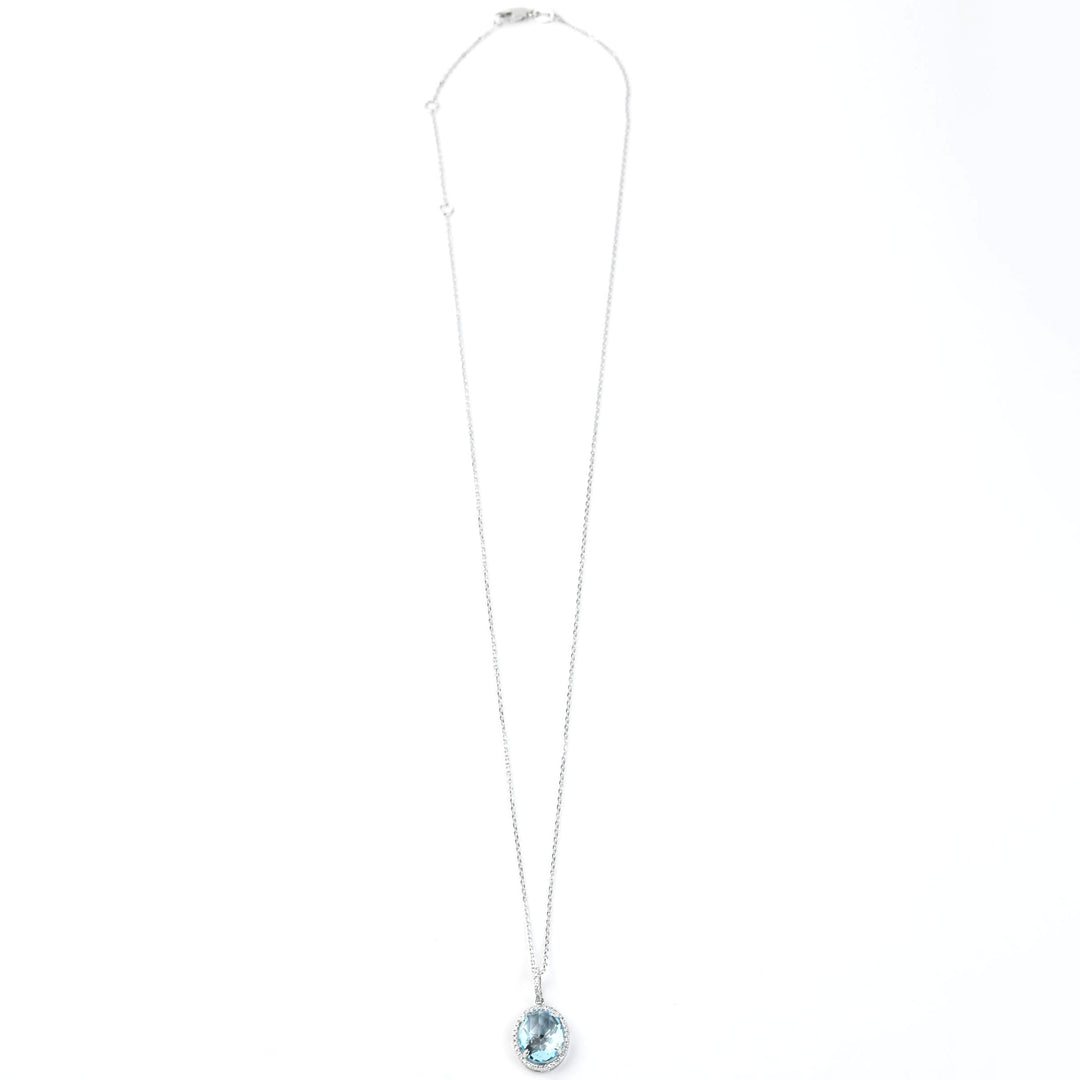 Blue Topaz and Diamond Halo Necklace in 14k White Gold