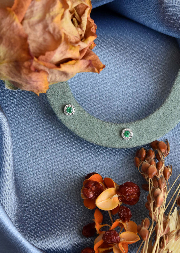 Emerald and Diamond Halo Studs in 14k White Gold - Goldmakers Fine Jewelry