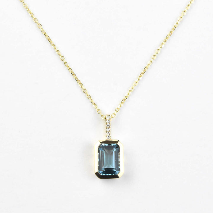 Emerald-Cut London Blue Topaz & Diamond Necklace 14k Yellow Gold - Goldmakers Fine Jewelry
