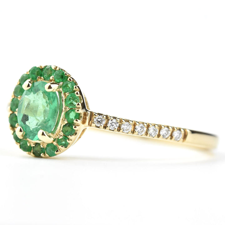 Oval Emerald Halo and Diamond Ring in 14k Yellow Gold - Goldmakers Fine Jewelry