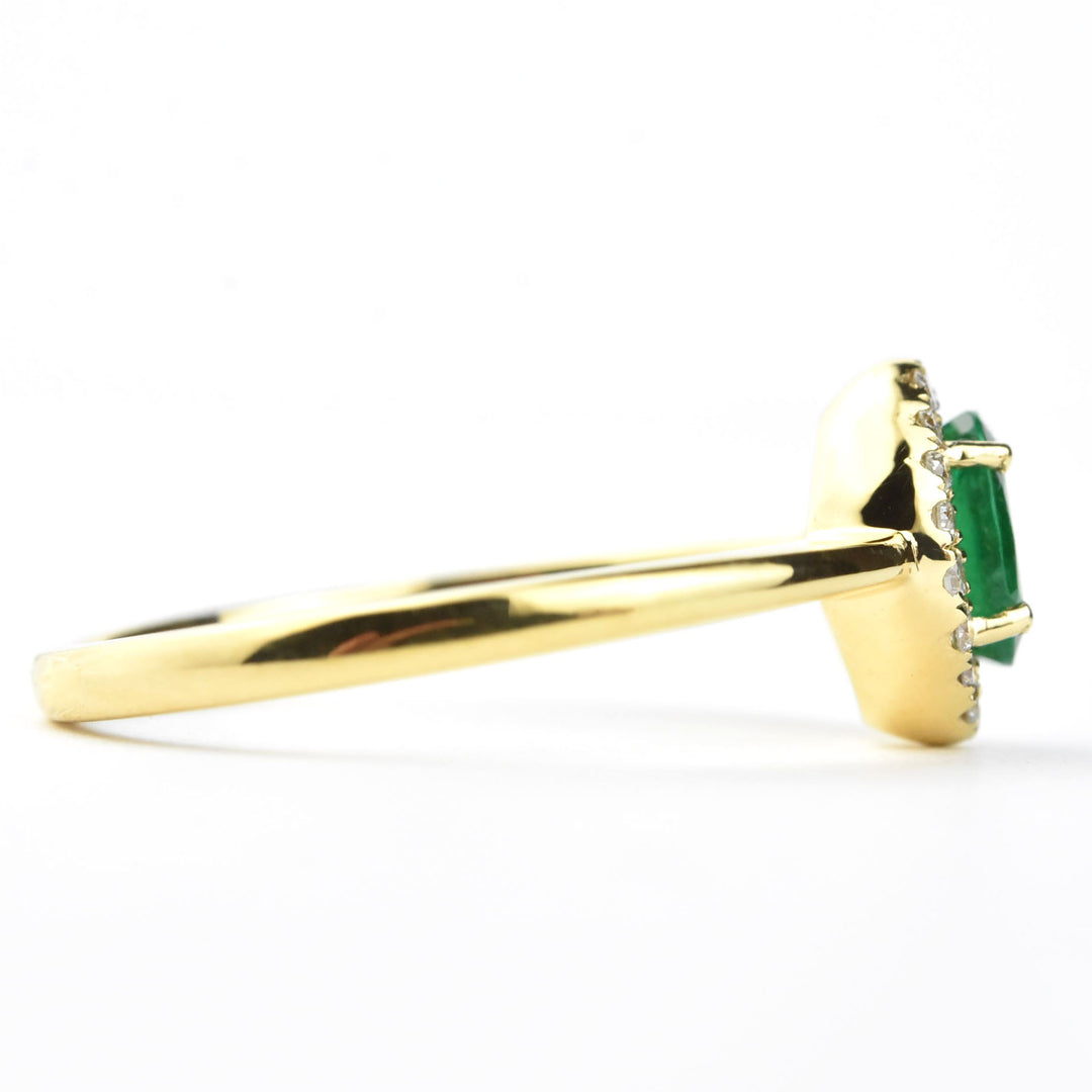 Emerald and Diamond Halo Ring in 18k Yellow Gold