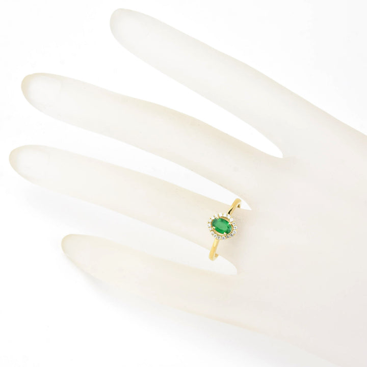 Emerald and Diamond Halo Ring in 18k Yellow Gold