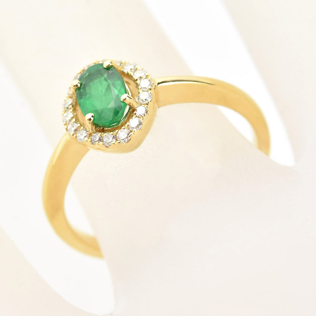 Emerald and Diamond Halo Ring in 18k Yellow Gold