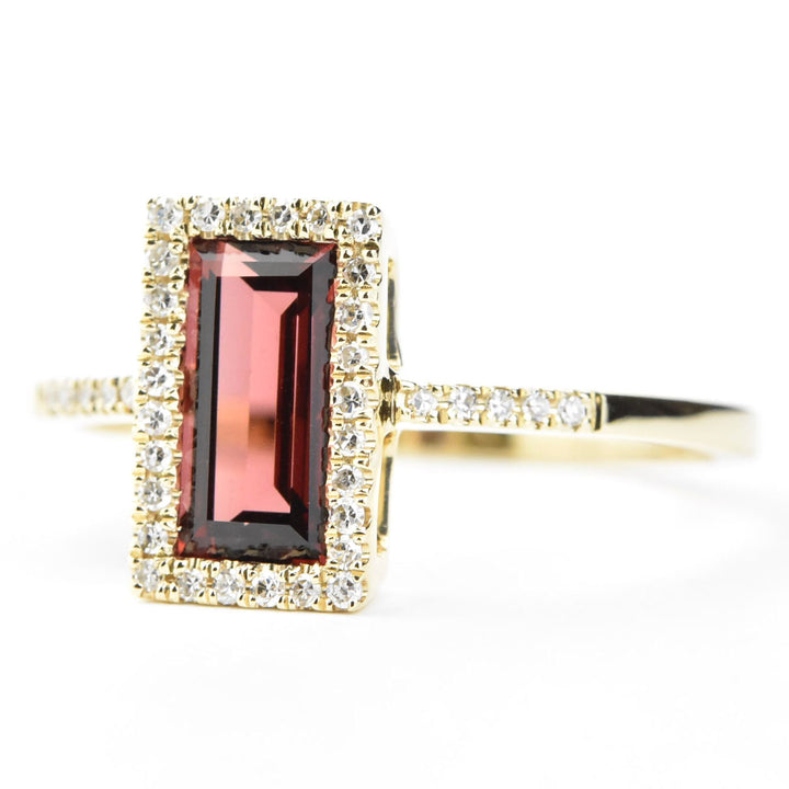 Garnet and Diamond Halo Ring in Yellow Gold