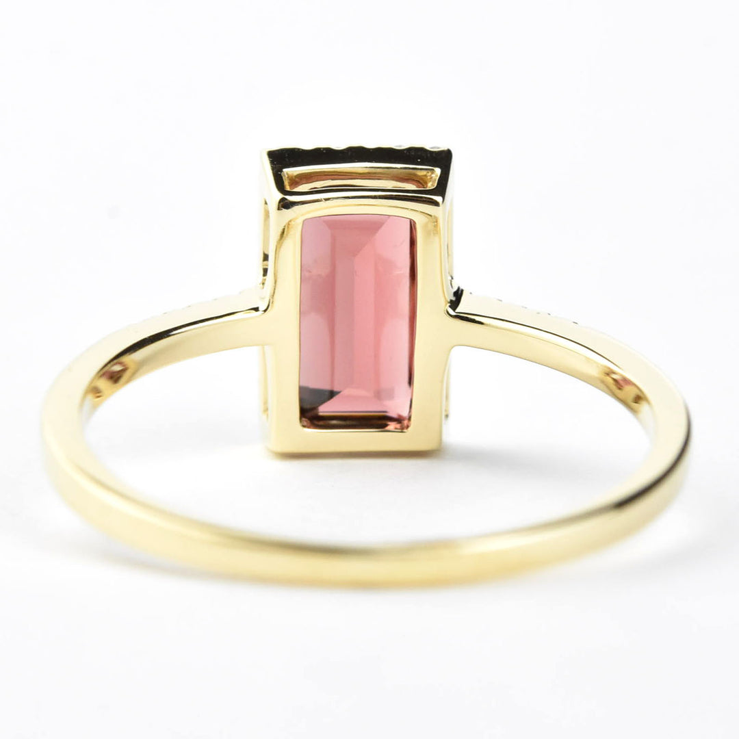 Garnet and Diamond Halo Ring in Yellow Gold
