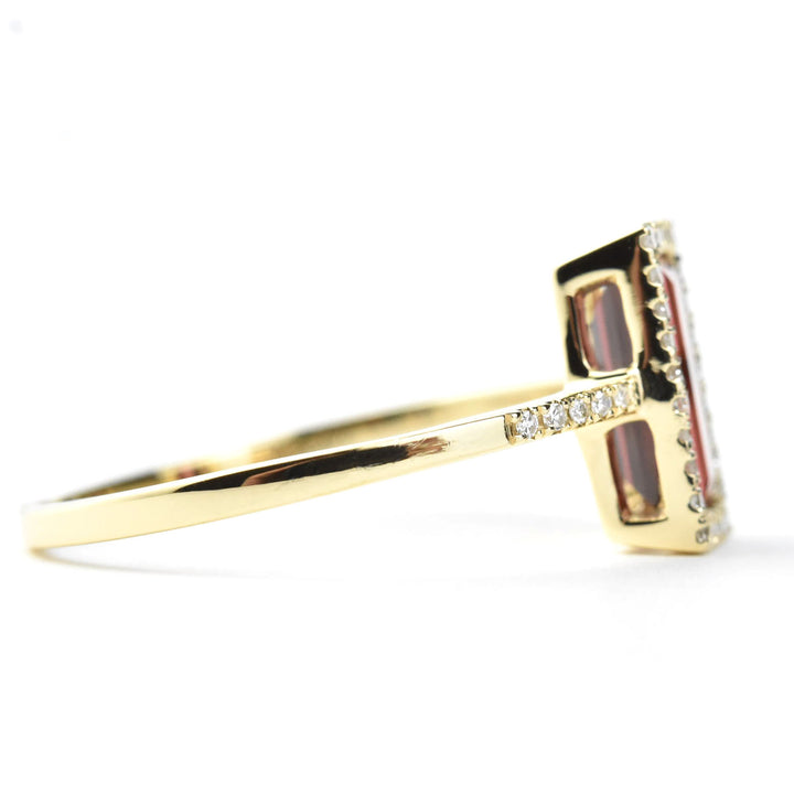 Garnet and Diamond Halo Ring in Yellow Gold