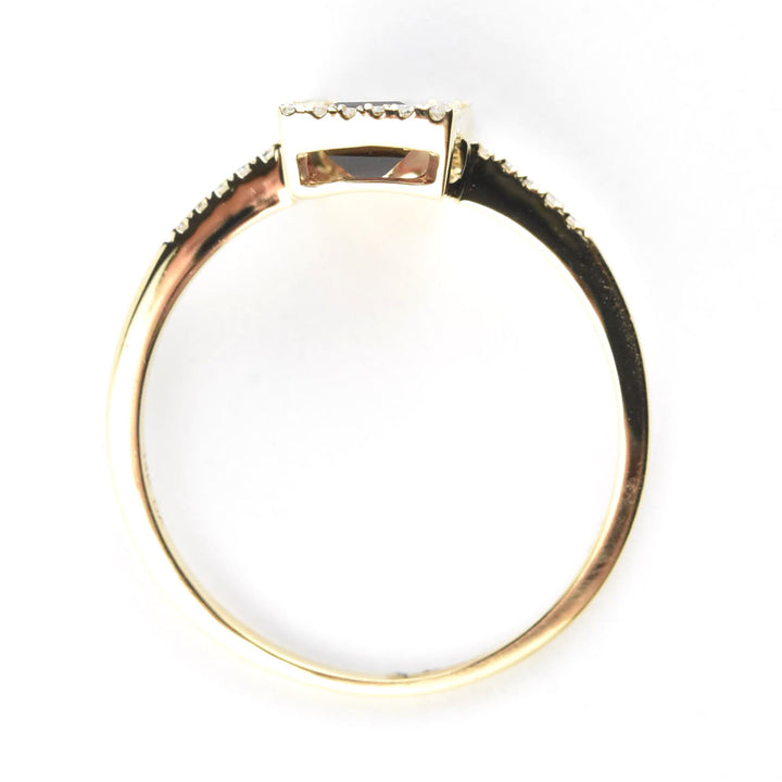 Garnet and Diamond Halo Ring in Yellow Gold