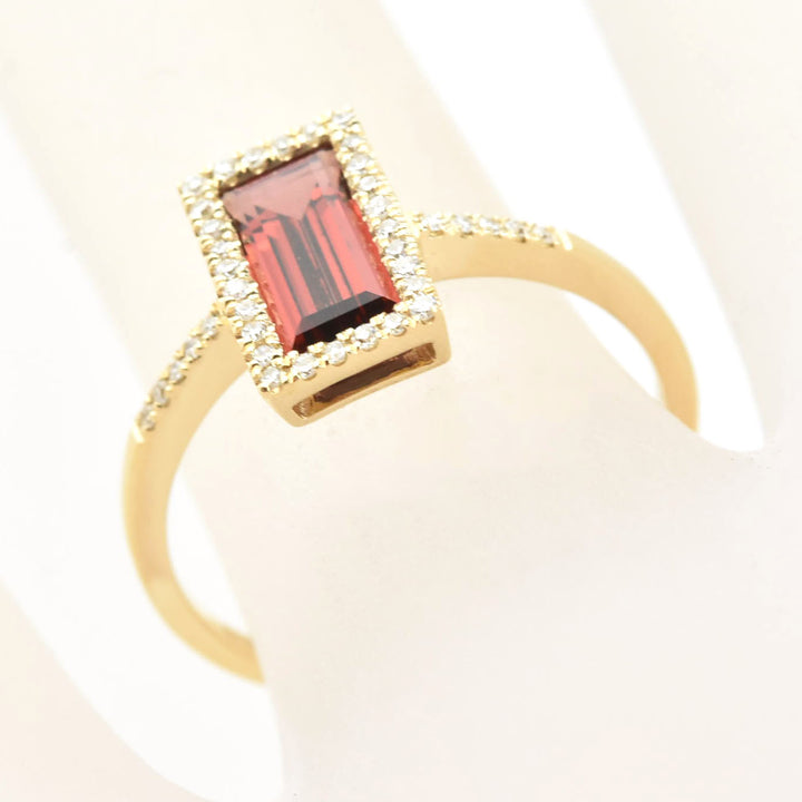 Garnet and Diamond Halo Ring in Yellow Gold