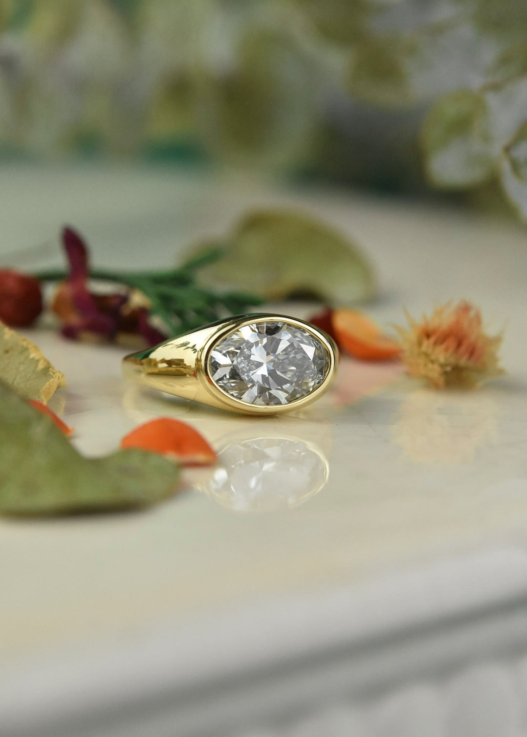 East West Oval Cut Diamond Ring in 14k Yellow Gold