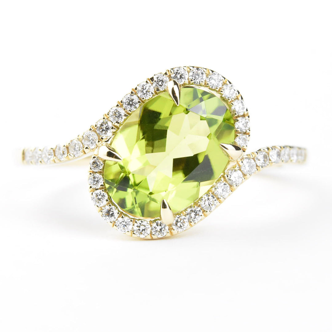 Peridot and Diamond Bypass Ring in 14k Yellow Gold