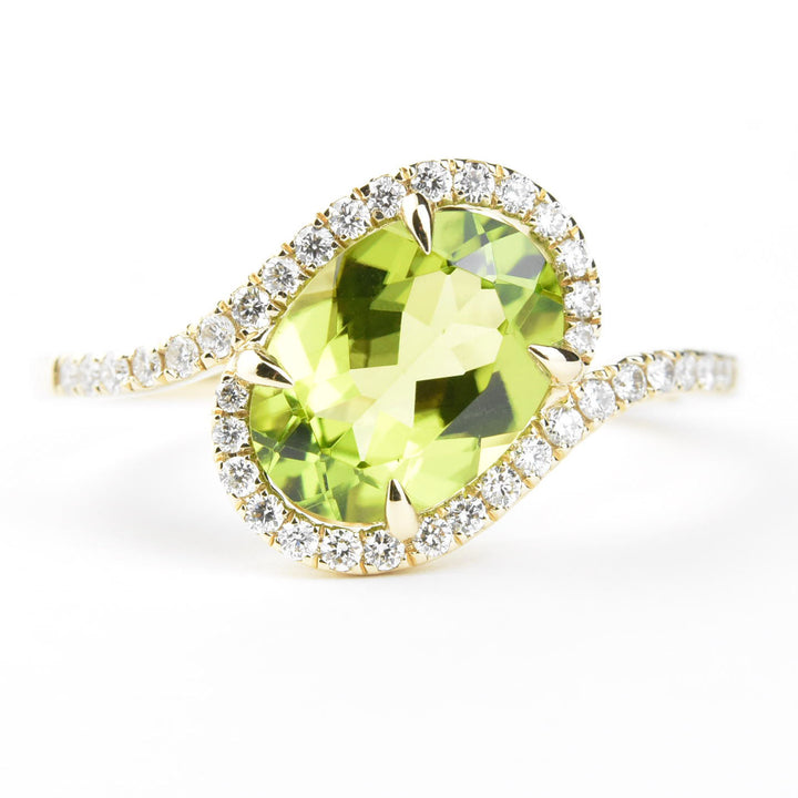 Peridot and Diamond Bypass Ring in 14k Yellow Gold