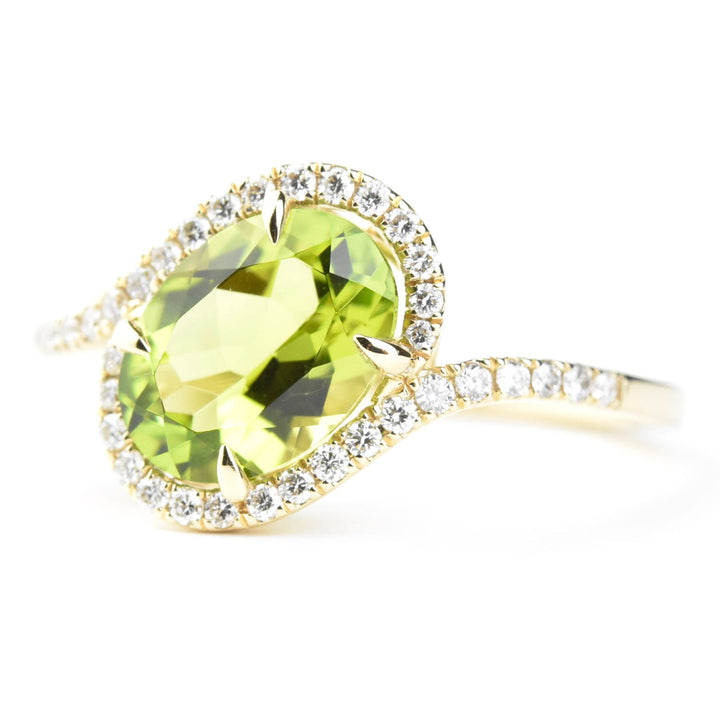Peridot and Diamond Bypass Ring in 14k Yellow Gold