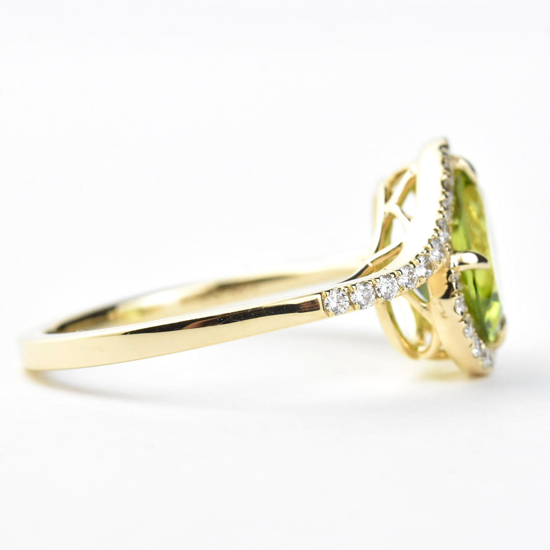 Peridot and Diamond Bypass Ring in 14k Yellow Gold