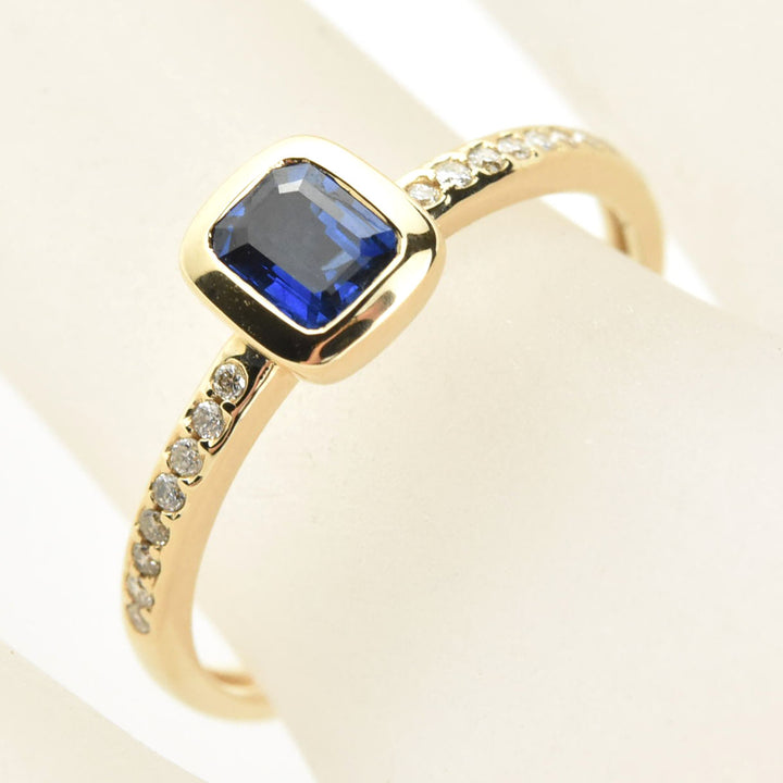 Bezel Set Blue Sapphire and Diamond Solitaire