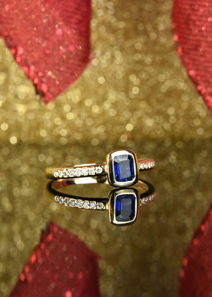 Bezel Set Blue Sapphire and Diamond Solitaire