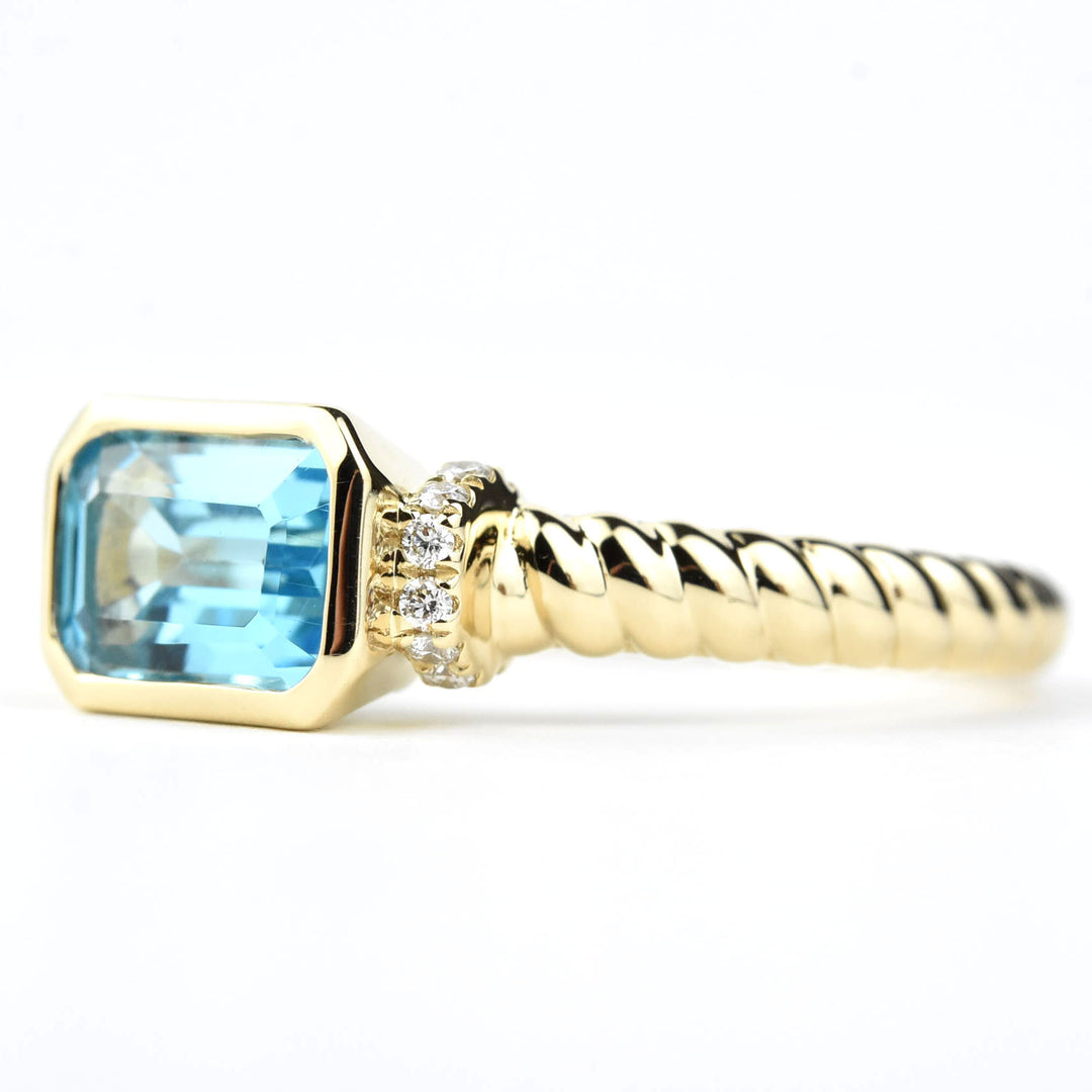 East-West Blue Topaz and Diamond Ring