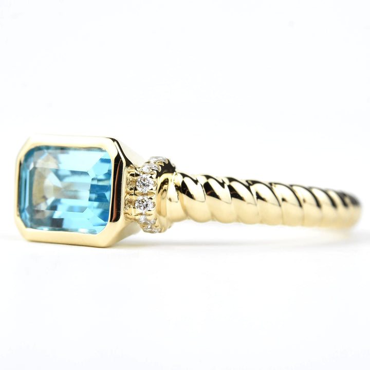 East-West Blue Topaz and Diamond Ring