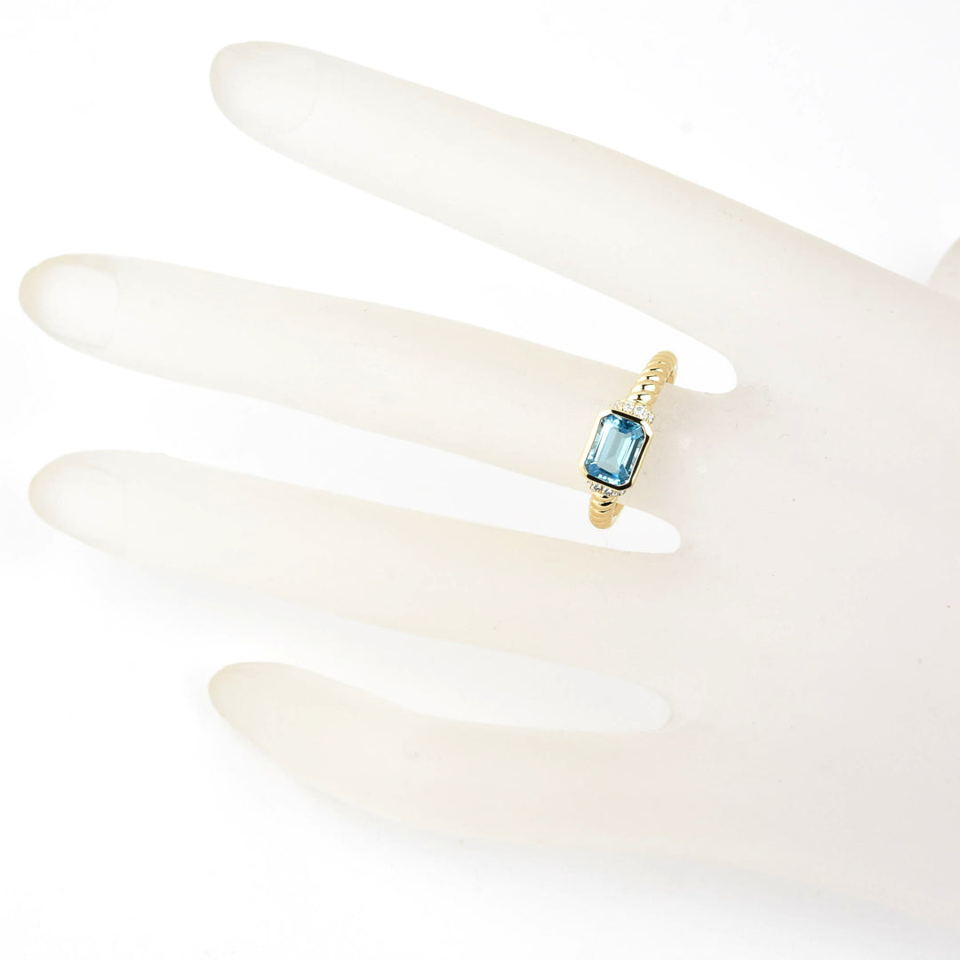 East-West Blue Topaz and Diamond Ring