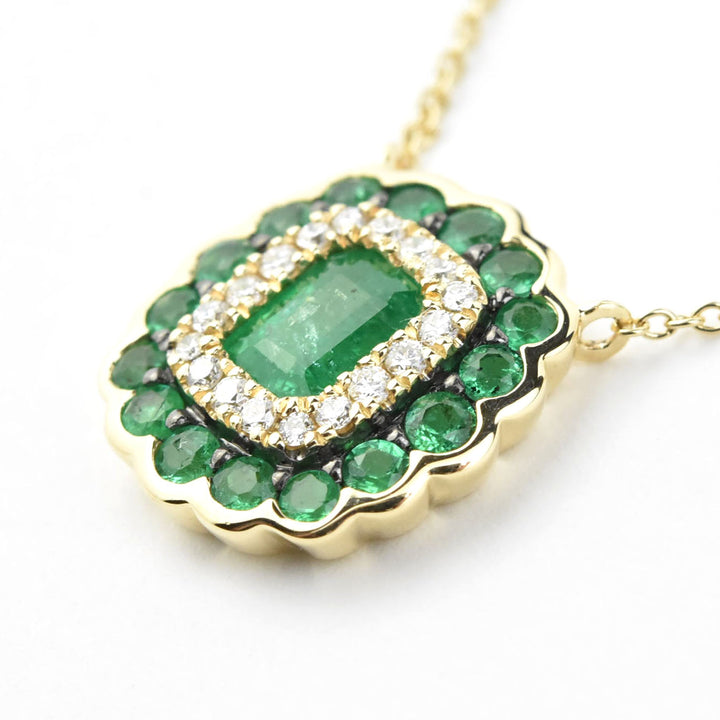 Emerald Halo Necklace in 14k Gold