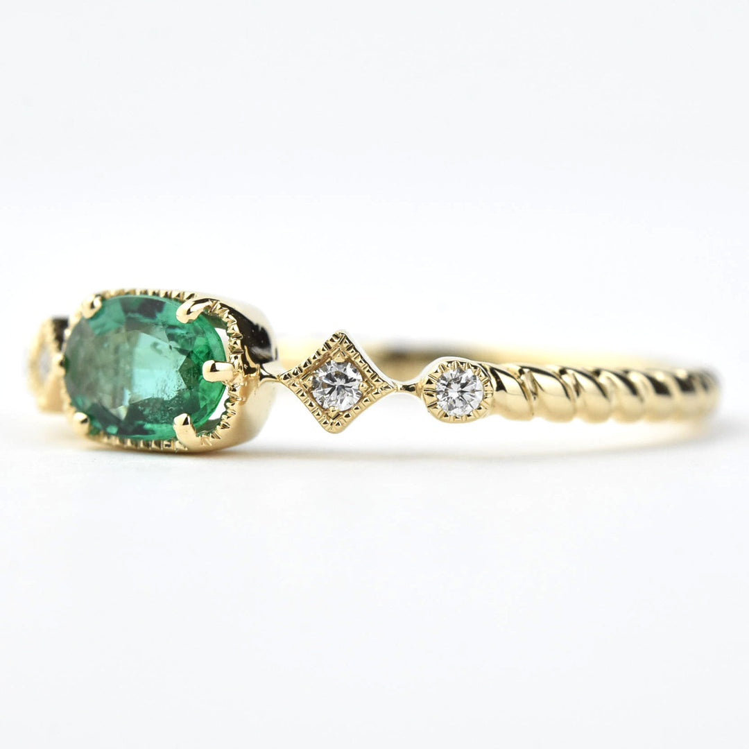 East-West Emerald and Diamond Ring In 14k Yellow Gold - Goldmakers Fine Jewelry