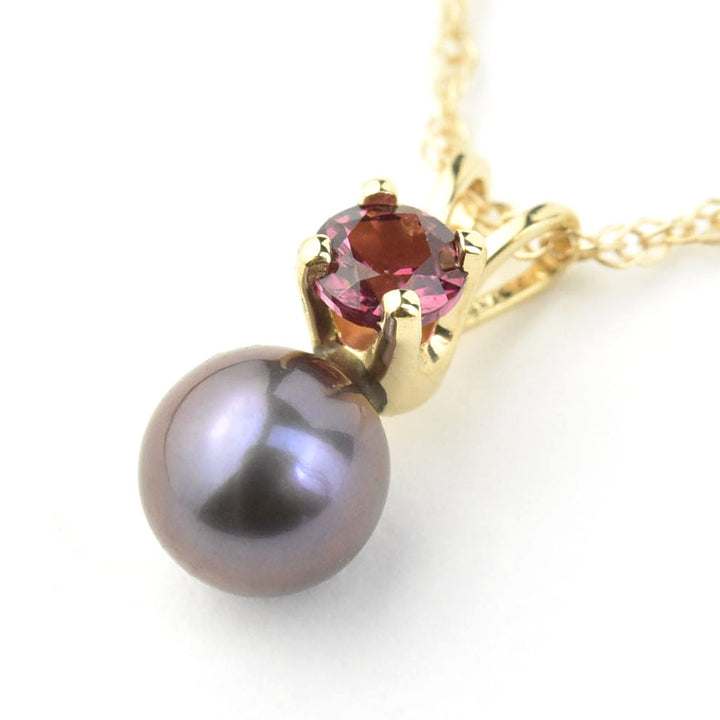 Fine Black Pearl and Garnet Pendant Necklace in Yellow Gold