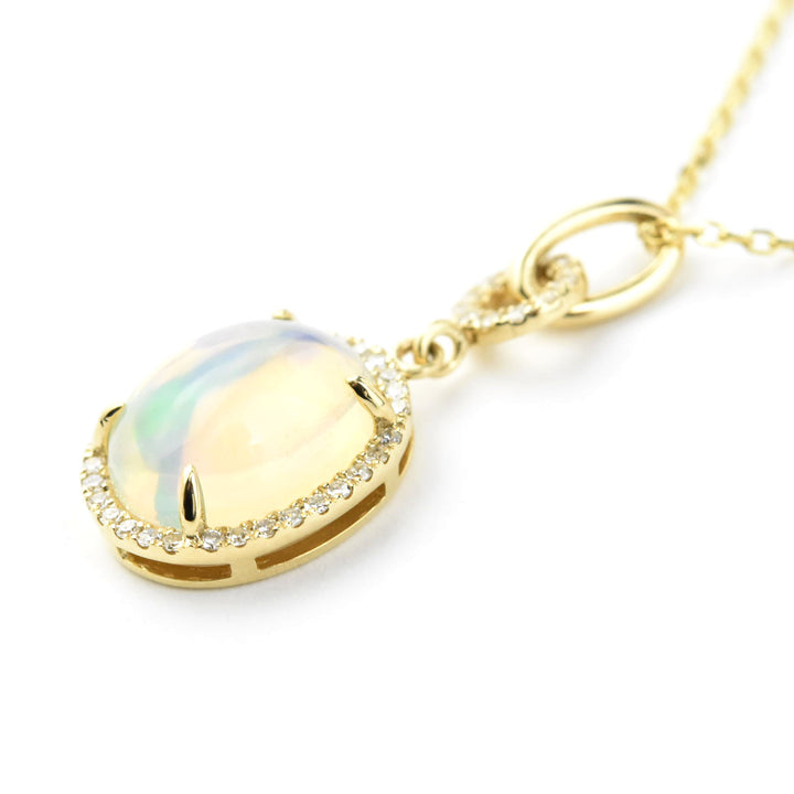 Opal and Diamond Halo Necklace in Yellow Gold