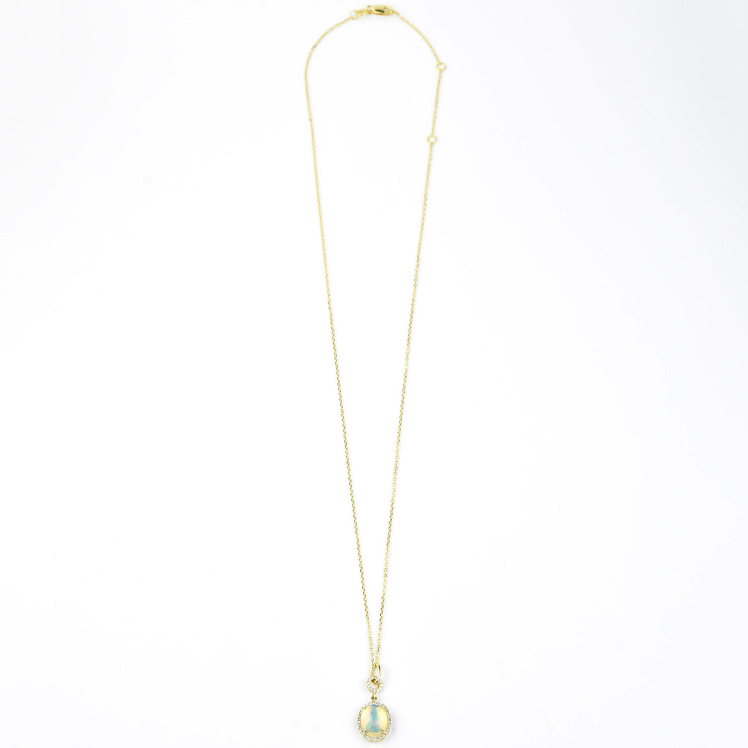 Opal and Diamond Halo Necklace in Yellow Gold