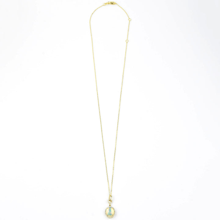 Opal and Diamond Halo Necklace in Yellow Gold