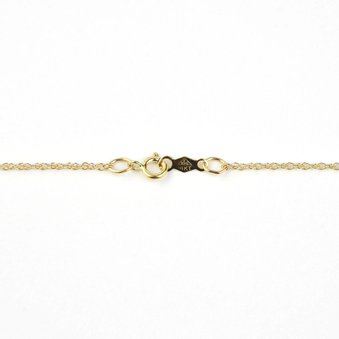 Fine Black Pearl and Garnet Pendant Necklace in Yellow Gold