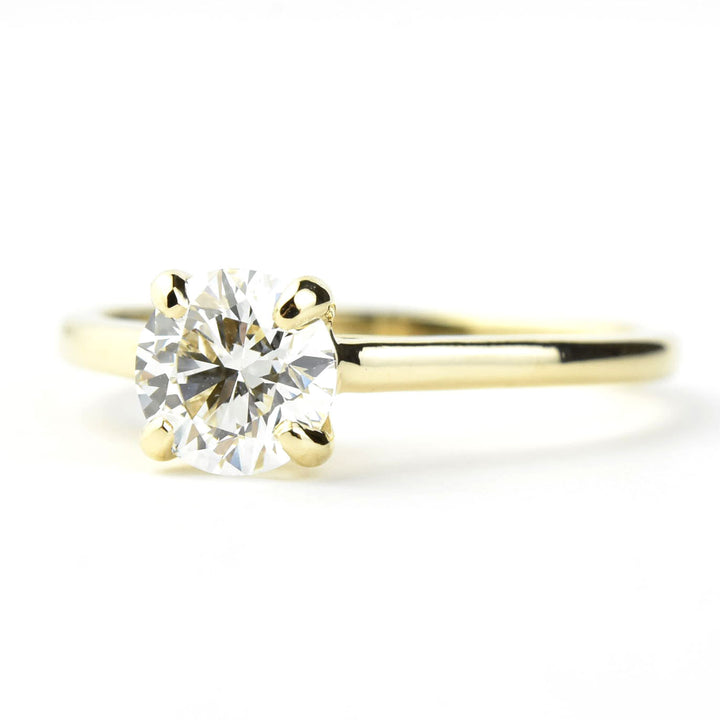 Diamond Solitaire with Cathedral Setting in 14k Gold