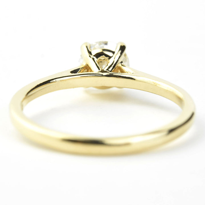 Diamond Solitaire with Cathedral Setting in 14k Gold