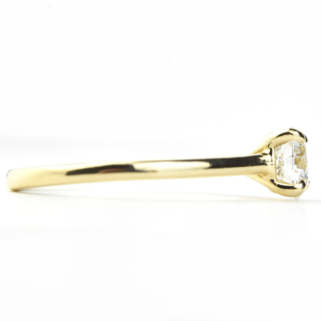 Diamond Solitaire with Cathedral Setting in 14k Gold