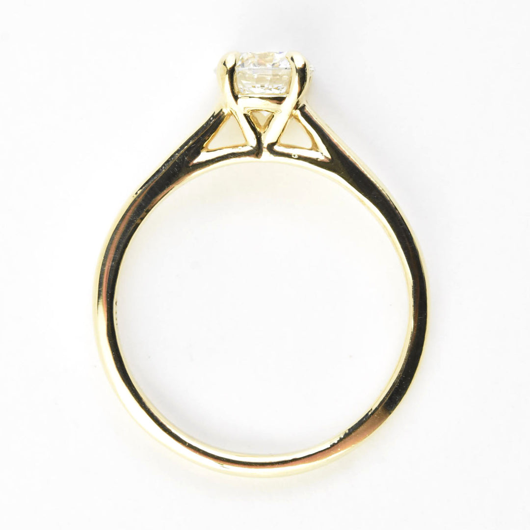 Diamond Solitaire with Cathedral Setting in 14k Gold