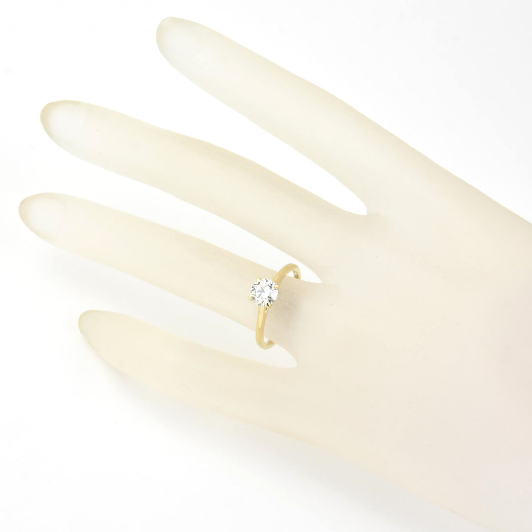 Diamond Solitaire with Cathedral Setting in 14k Gold