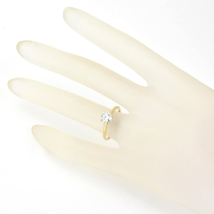 Diamond Solitaire with Cathedral Setting in 14k Gold