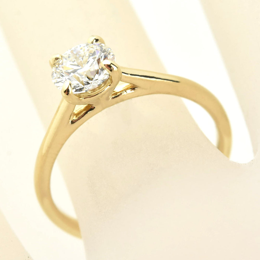 Diamond Solitaire with Cathedral Setting in 14k Gold