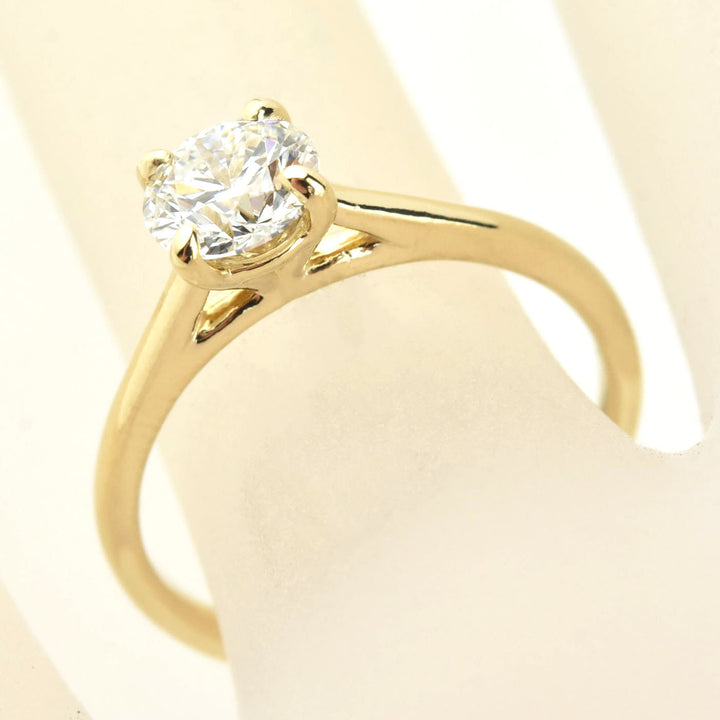 Diamond Solitaire with Cathedral Setting in 14k Gold