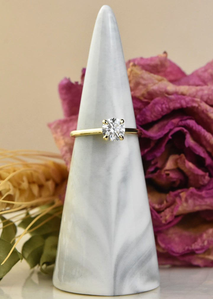 Diamond Solitaire with Cathedral Setting in 14k Gold