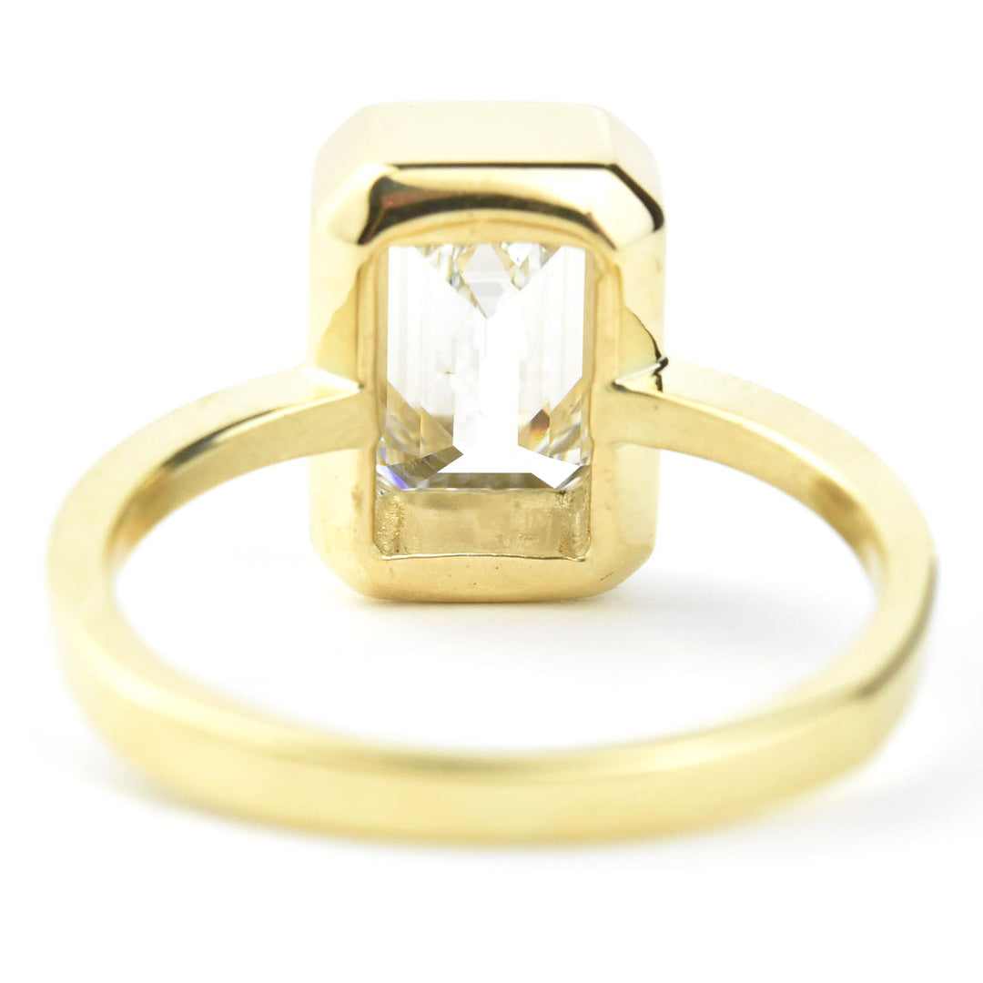 Emerald Cut Diamond Solitaire in Yellow Gold