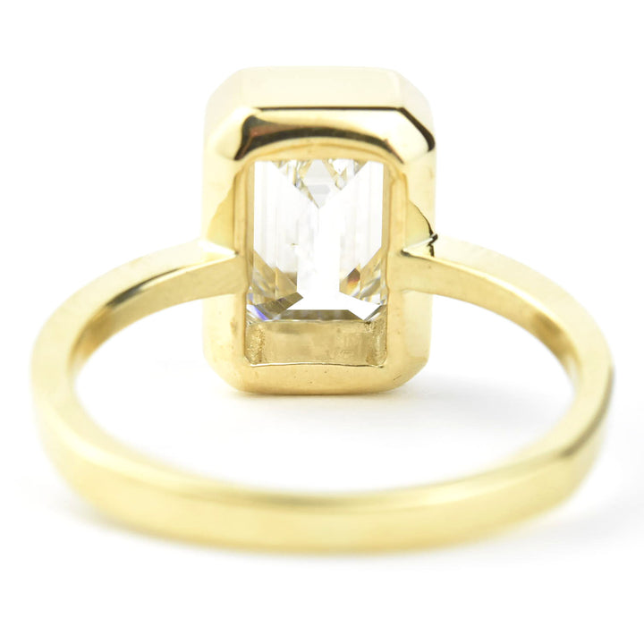 Emerald Cut Diamond Solitaire in Yellow Gold