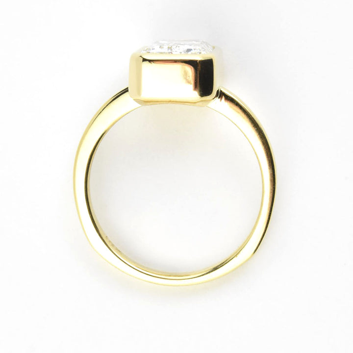 Emerald Cut Diamond Solitaire in Yellow Gold