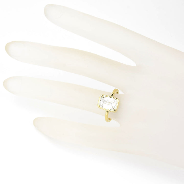 Emerald Cut Diamond Solitaire in Yellow Gold