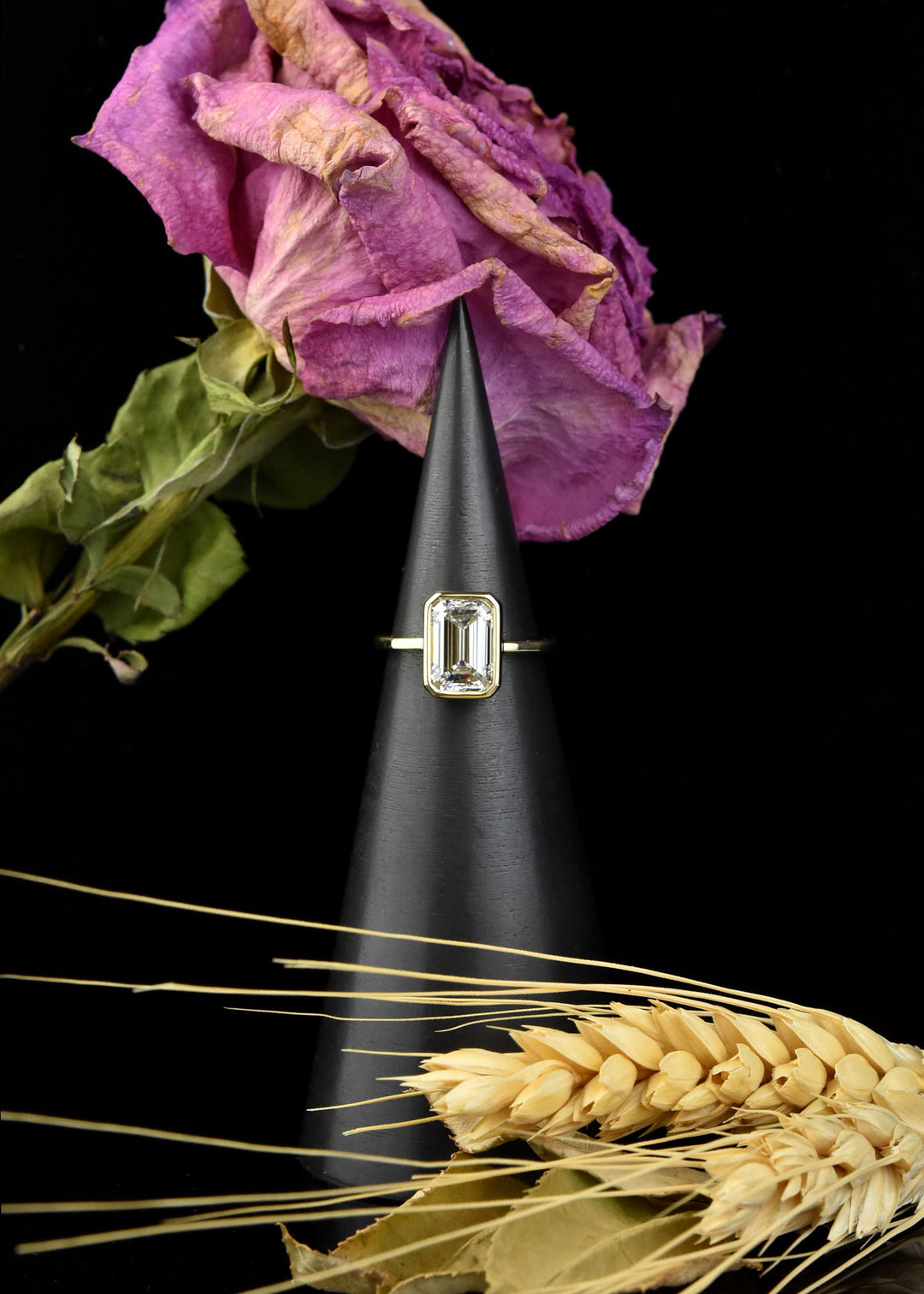 Emerald Cut Diamond Solitaire in Yellow Gold