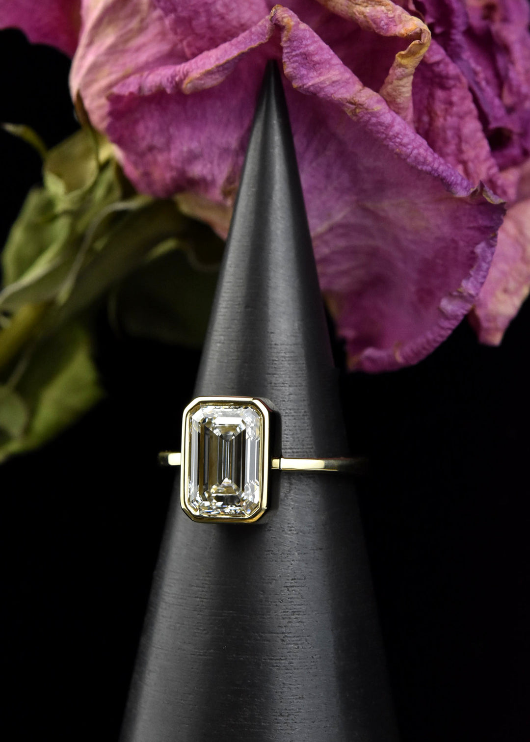 Emerald Cut Diamond Solitaire in Yellow Gold