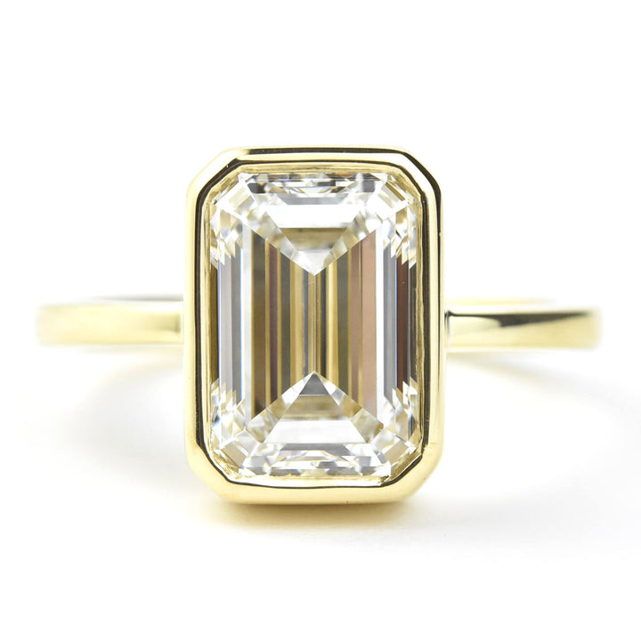 Emerald Cut Diamond Solitaire in Yellow Gold