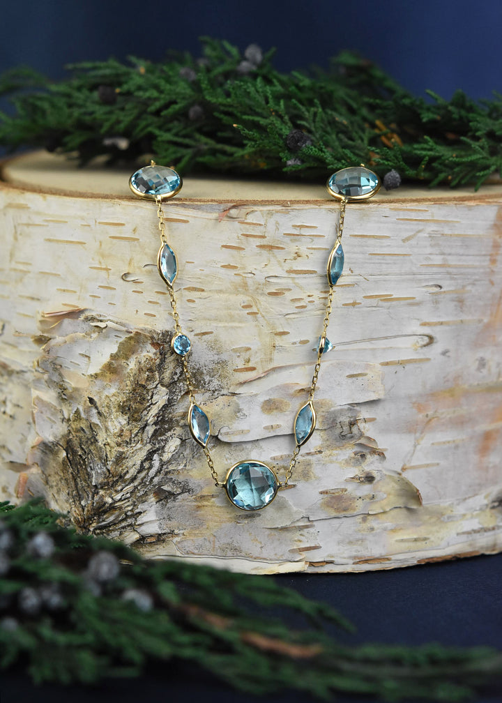 Blue Topaz Station Necklace in 14k Yellow Gold