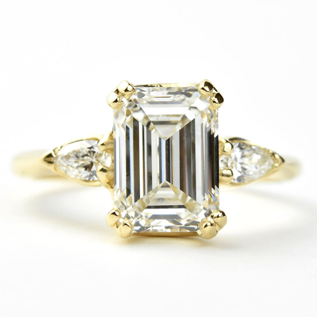 Emerald-cut Diamond Engagement Ring with Pear Accents