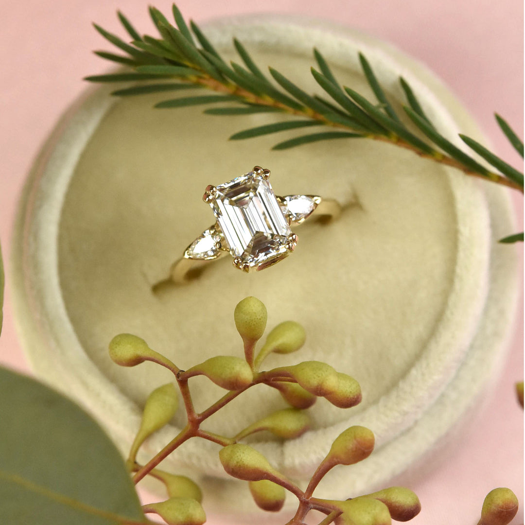 Emerald-cut Diamond Engagement Ring with Pear Accents