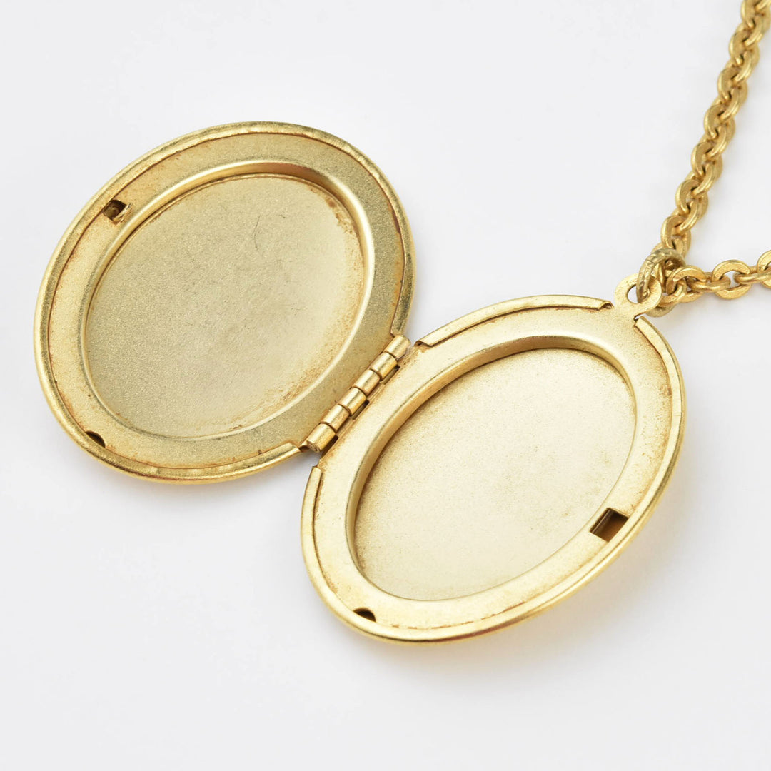 Golden Fleur-de-lis Locket - Goldmakers Fine Jewelry