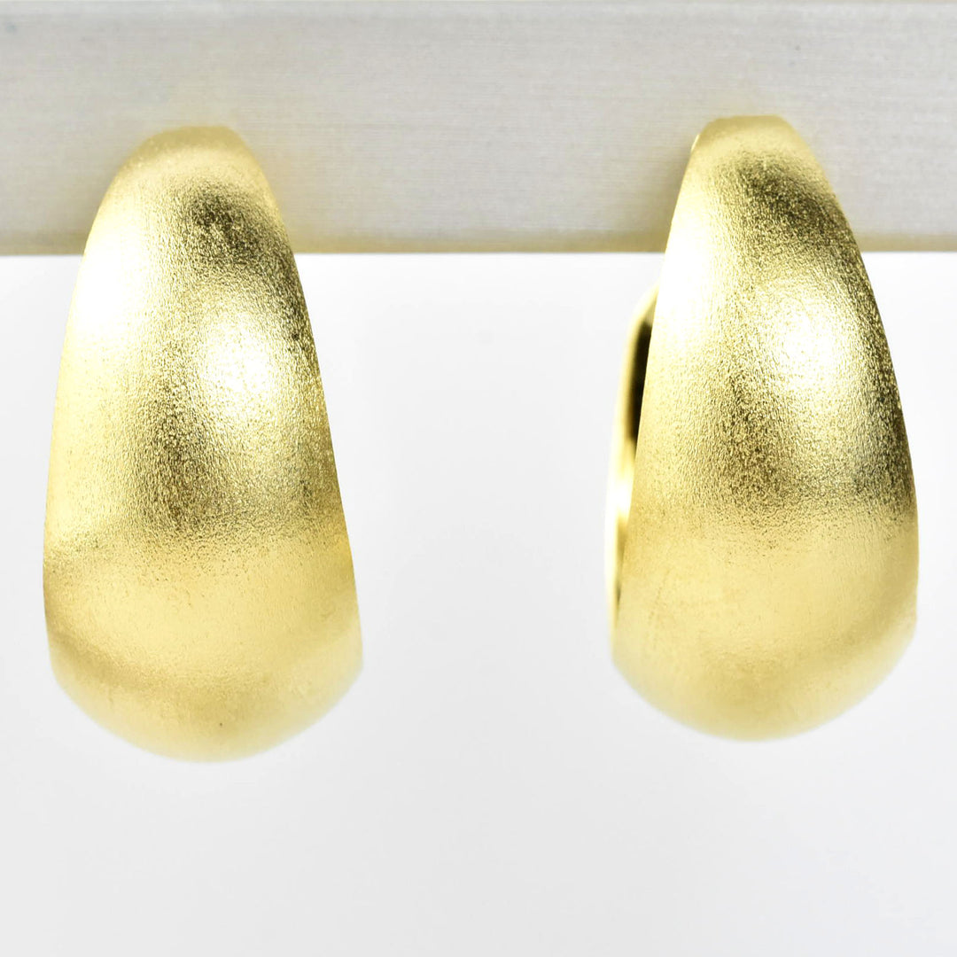 Medium Curved Gold Tone Hoops